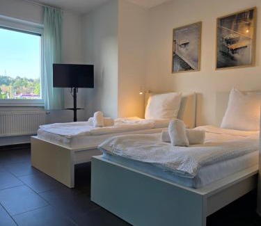 Ibbenbueren Apartment | APARTMENT PD23 ALTE FEUERWACHE I Ganze Wohnung I 5 Einzelbetten I 3 Zimmer I 3min CityHospital I 50m Supermarkt I Küche I SmartTV