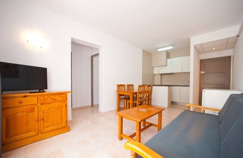 Santa Eulalia del Rio Apartment | Apartment Ses Veles 2 dormitorios close to the Beach with Sea View, Pool, Wi-Fi & Garden