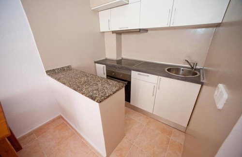 Santa Eulalia del Rio Apartment | Apartment Ses Veles 2 dormitorios close to the Beach with Sea View, Pool, Wi-Fi & Garden