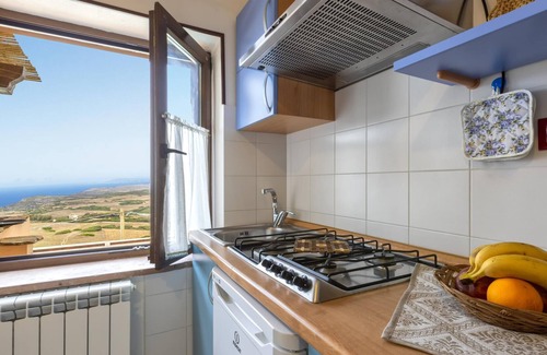 Sassari Apartment | Apartment "Vista Mare" with Sea View, Pool, Wi-Fi, Garden & Terrace