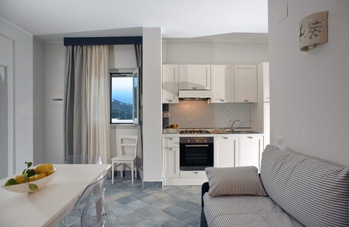 Villammare Apartment | Apartment with terrace. Shared pool. 150 metres from beach