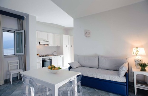 Villammare Apartment | Apartment with terrace. Shared pool. 150 metres from beach