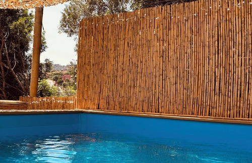 Tiriddo Apartment | APPART COSY is located near the beautiful beaches with a view of Isola di Tavolara