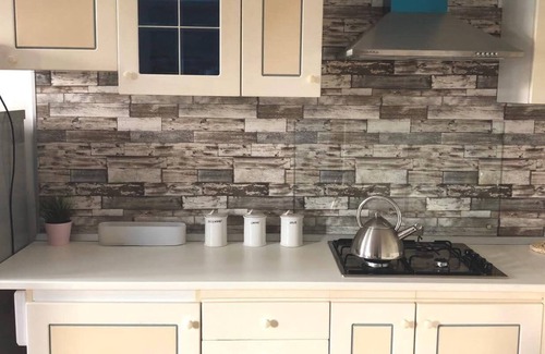 Faro Apartment | appartamento con giardino privato 3 minuti dalla spiaggia