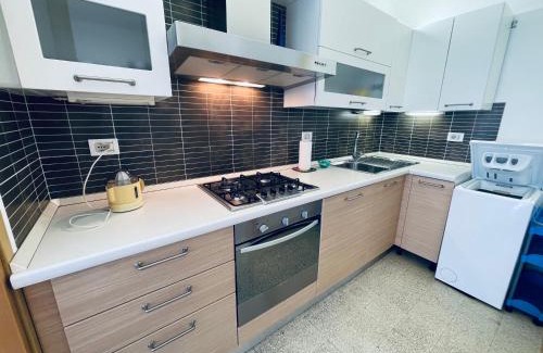 Faro Apartment | Appartamento Saturno n. 18 - vista mare - 4° piano con ascensore