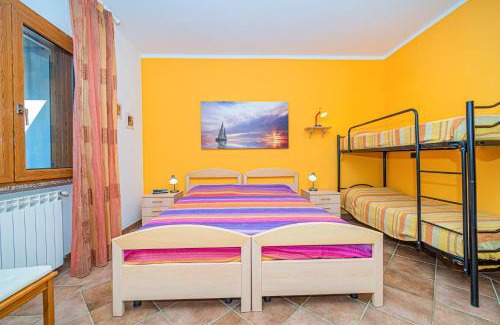 Capoliveri Apartment | Appartamento villa da 4 fino a 5 persone giardino