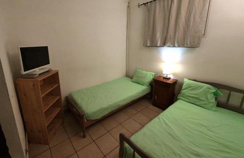 Le Fossat Apartment | Appartement avec jardin centre village avec accès PMR