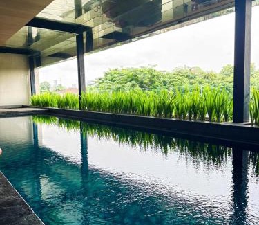 Bangka Apartment | Apt Kemang Village Tower Intercon with Wi-Fi and Pool by Damaresa