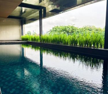 Bangka Apartment | Apt Kemang Village Tower Intercon with Wi-Fi and Pool by Damaresa