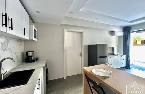 Wolmar Condo | APT Le Sunset – Flic en Flac Air conditioning Wi-Fi 2 minutes from the beach