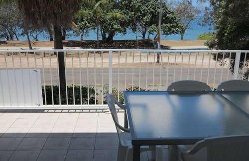 Arcadia Apartment | Arcadia Beach Unit 4 - Charming sunny apartment with front row balcony view over Geoffrey Bay