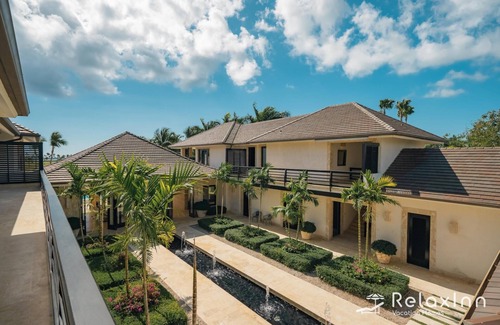 Punta Cana Villa | Arrecife 55 - Dramatic luxury villa with golf and ocean view