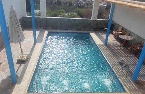 Seheil Island Ski Chalet | ashria pool gest house