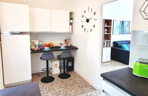 Dongo House | At Nina & Turi's house with garden and veranda