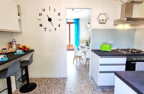 Dongo House | At Nina & Turi's house with garden and veranda