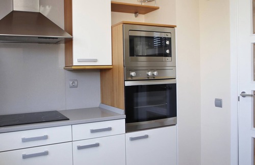 Torredembarra Apartment | AT142 Nova Torredembarra: Apartamento con una zona comunitaria con piscina y jardín