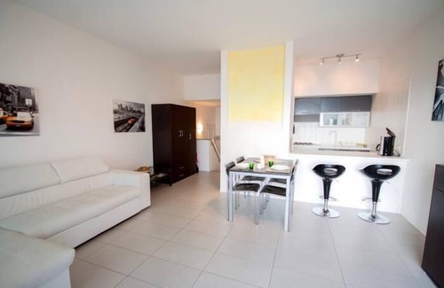 Susello Apartment | Attractive 2-room apartment with sunbath, pool and dream view