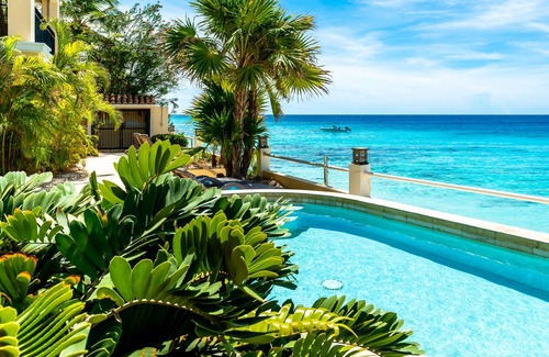 Belnem Condo | August Special oceanfront apartment Bellevue 1 with private sandy beach & pool