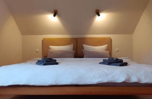 Laubach Apartment | Auszeit am Vulkan - Appartements mit Fasssauna