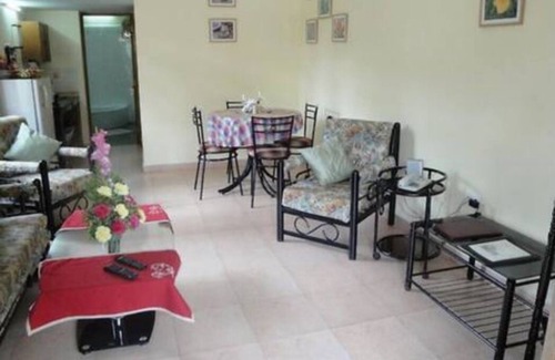 Betalbatim Apartment | Authentic Goa Home Surrounded by Coconut Palm Trees & Pool at Sandray
