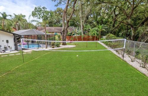 Palm Harbor House | Backyard Games, Fire Pit, Heated Pool, Near Beach