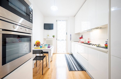 San Leonardo Apartment | Balcony Bliss: Elegant Parma Residency