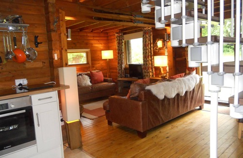 Strathyre Cabin | Balvaig River Log Cabin, with wood burning stove, alpine charm on water's edge
