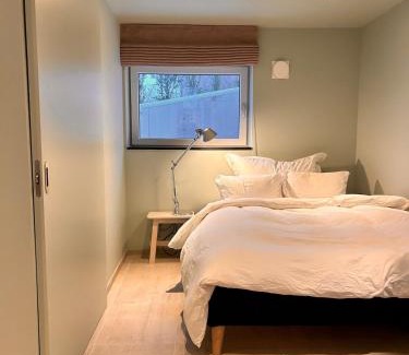 Haugesund Apartment | Basement apartment with sea view