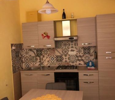 Basico House | Basicò un balcone sul mare-Casa I CARRUGGI- Case vacanza Sicilia&Toscana-