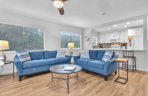 Caswell Beach Condo | Beach Getaway Among the Oaks: Community Pools, Short Walk to Beach Access