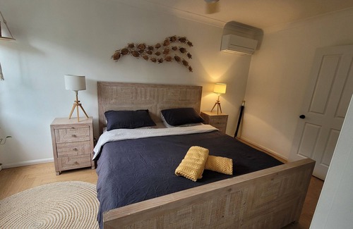Woody Point House | Beach House - Stunning property with ocean views and stones throw from the beach