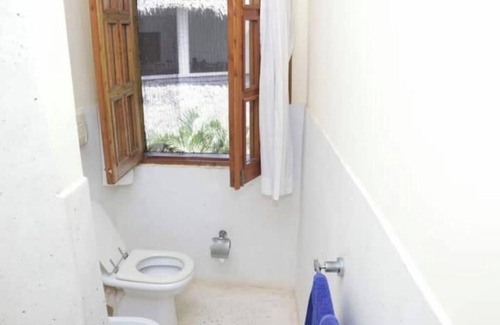 Malindi House | Beachfront 2 bedroom villa in resort with Pool Spann