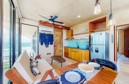 Tulsayab Apartment | Beachfront apt on the beach with community pools, kitchenette, AC, hammock
