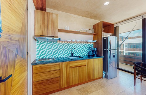 Tulsayab Apartment | Beachfront apt on the beach with community pools, kitchenette, AC, hammock