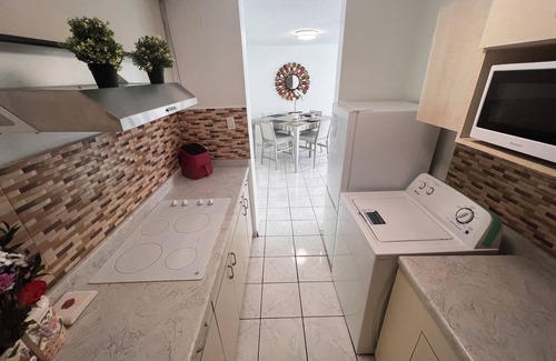 Isla Verde Apartment | Beachfront Bliss. 2BR Condo Steps to Isla Verde’s Award-Winning Beach