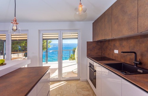 Tice Villa | Beachfront Casa Ahoi with 2 bedrooms, heated pool, Villa with amazing sea views