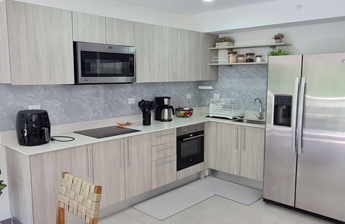 Punta Leona Apartment | Beachfront condo - 16th floor whith stunning forest view. Steps to the beach.