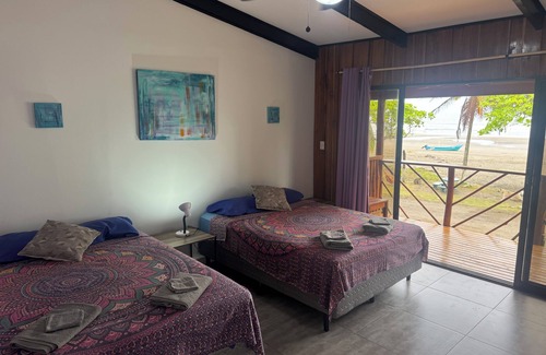 Esterillos Centro Hotel | Beachfront Escape in Esterillos Centro - Pool, A/C, WiFi & Private Rooms