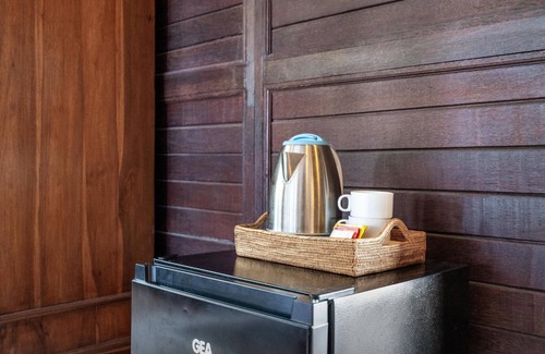 Candi Dasa Apartment | Beachfront Group Property – 9 Separate Rooms, 3 Levels | The Village of Angels