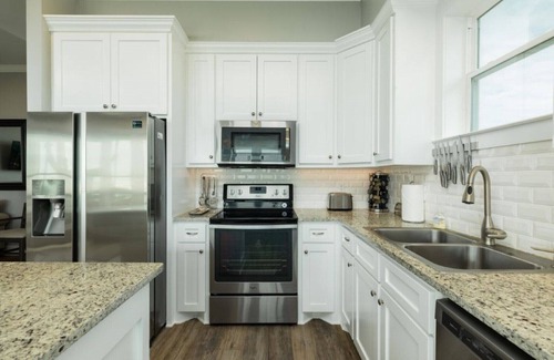 Spanish Grant House | BEACHFRONT! TEN STEPS TO BEACH SAND! PERFECT BEACH VACATION!