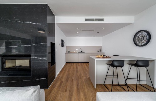 Duce Villa | Beachfront Villa Erce with private 40sqm heated pool, a Gym, 7 en-suite bedrooms, a rooftop terrace, 2 living areas