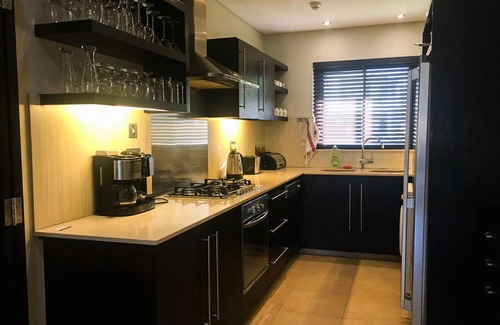 Grand River South East Apartment | Beachfront with Pool and Private beach Access