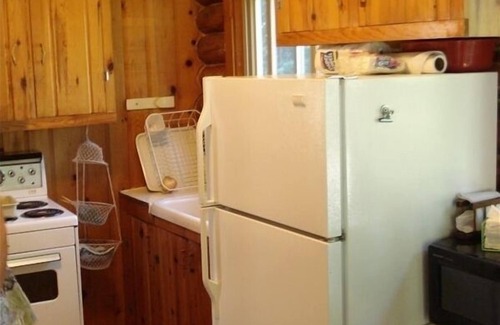 Herron House | Beautiful 2 bedroom log home on south end of Hubbard Lake