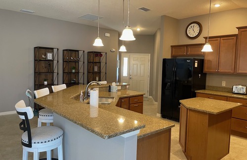 The Villages Villa | Beautiful 3/2 Villa Walking distance to Brownwood w/BBQ & Golf Cart!