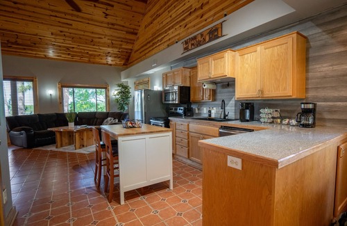 Backus Cabin | Beautiful 4-bedroom Lakefront cabin on Portage Chain of lakes in Backus