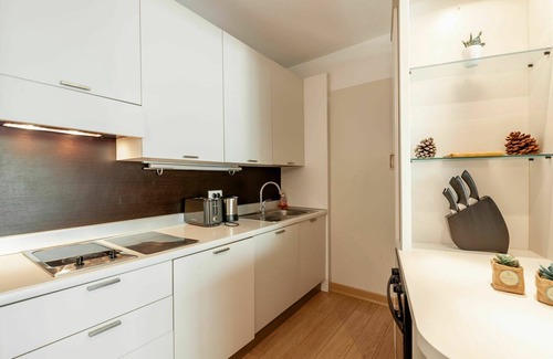 Santa Giulia Apartment | Beautiful apartment for 4 people with WIFI, A/C, pool, TV and patio