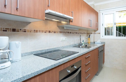 Cumbre del Sol Apartment | Beautiful apartment for 4 guests with pool, A/C, WIFI, TV, patio and parking