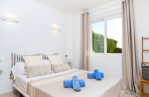 Cumbre del Sol Apartment | Beautiful apartment for 4 guests with pool, A/C, WIFI, TV, patio and parking