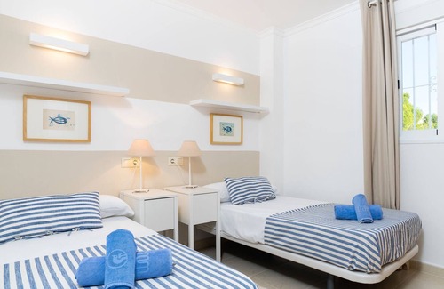 Cumbre del Sol Apartment | Beautiful apartment for 4 guests with pool, A/C, WIFI, TV, patio and parking