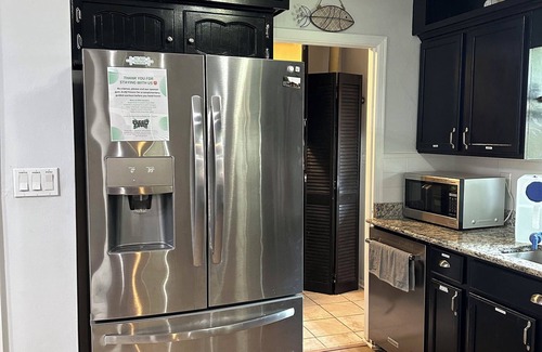 Gunter Afs House | Beautiful backyard and cozy interior has everything you need and is pet friendly